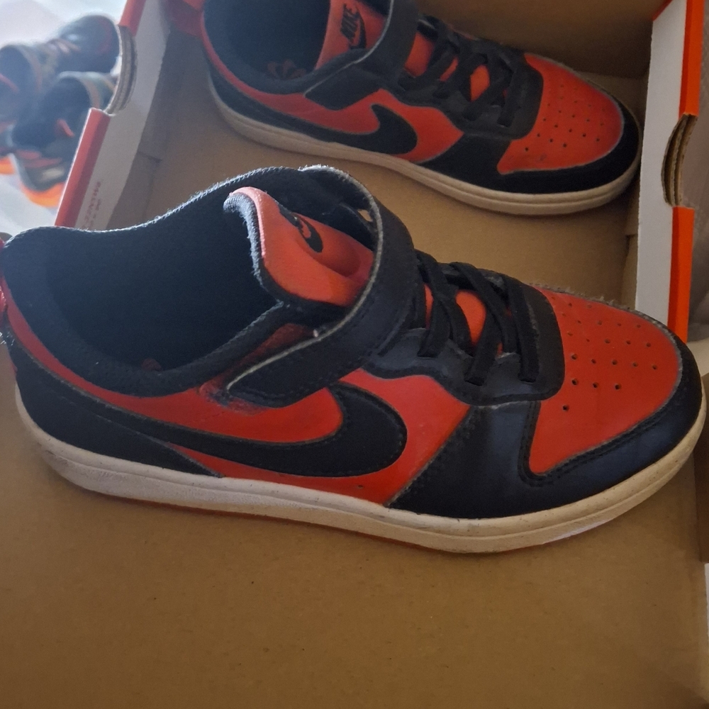 Boys red nike shoes